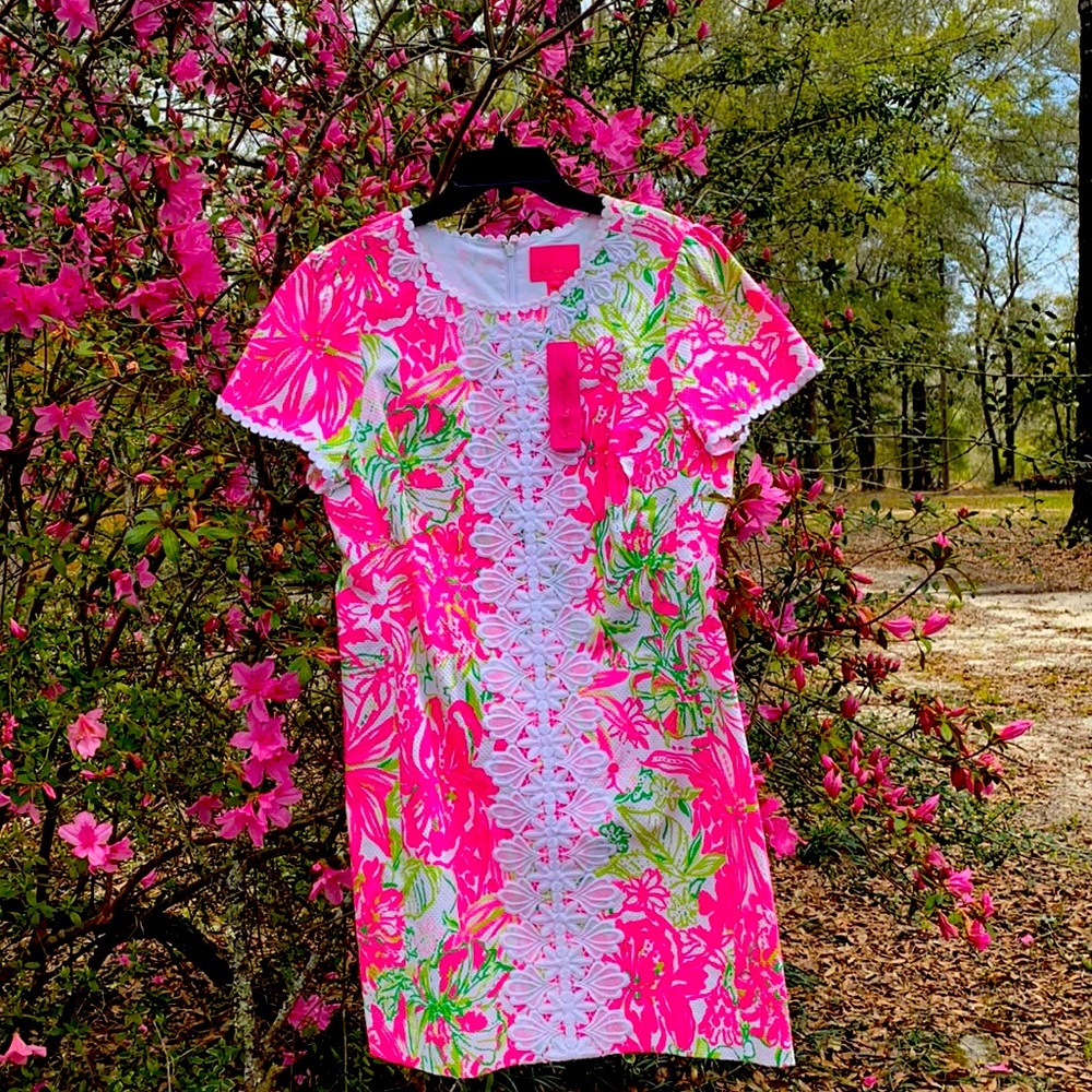 Bright pink Lilly Pulitzer perfect for any casual or dressy casual event .